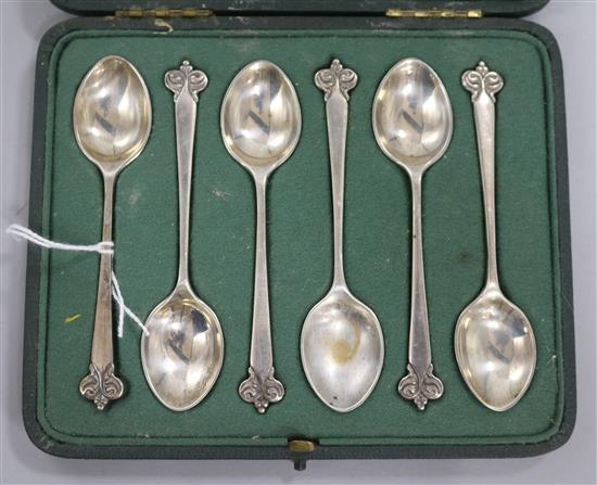A cased set of six George V Liberty & Co silver teaspoons, Birmingham, 1914, in original Liberty & Co box.